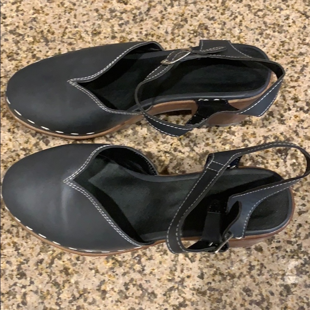 Mary Janes. Grey/black, brown soles. Never worn